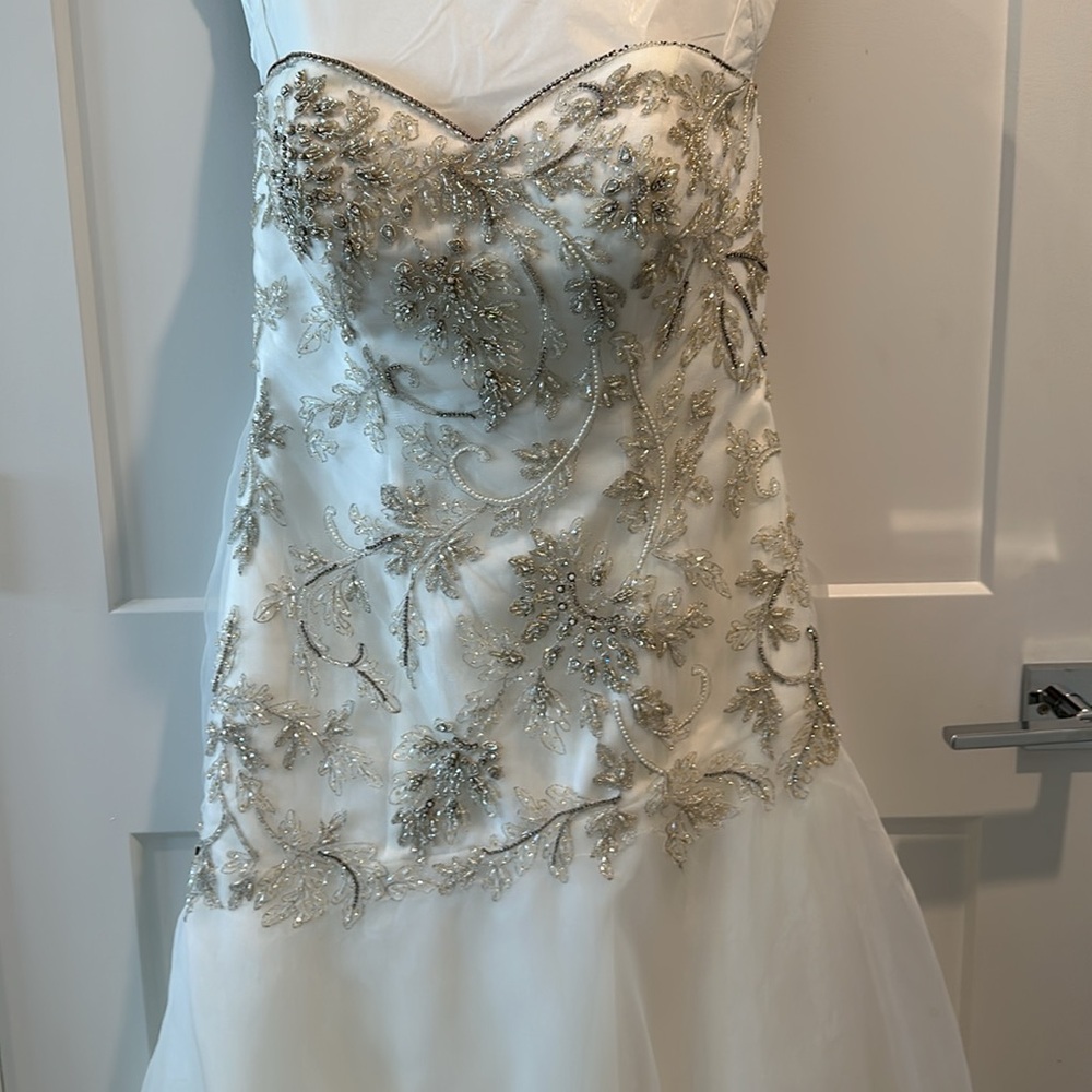 Casablanca strapless Wedding Gown w/ amazing beading and train.